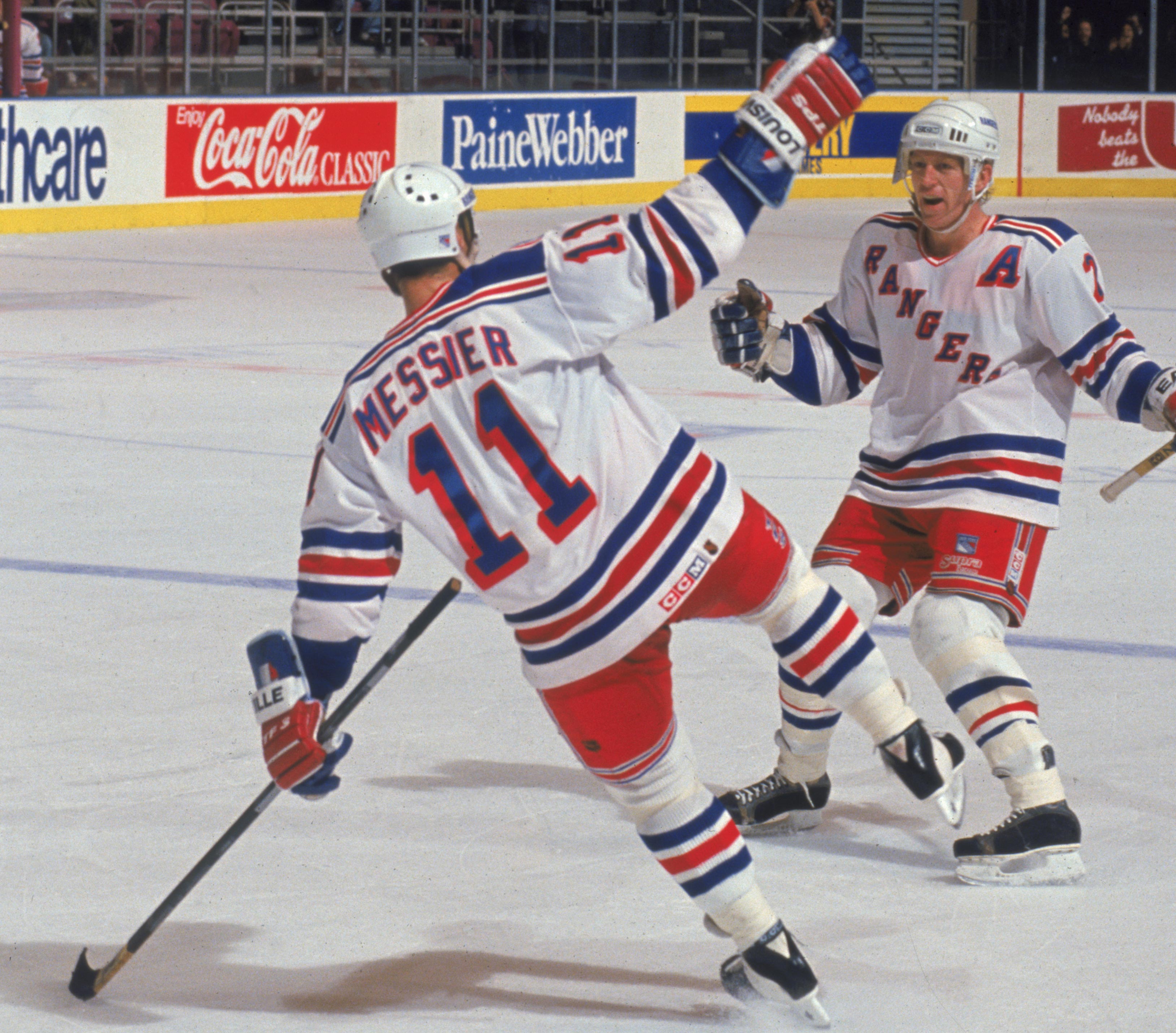 1996) Sergei Zubov, Brian Leetch, and Mark Messier work a perfect three-man  game up the full length of the ice. These guys could…